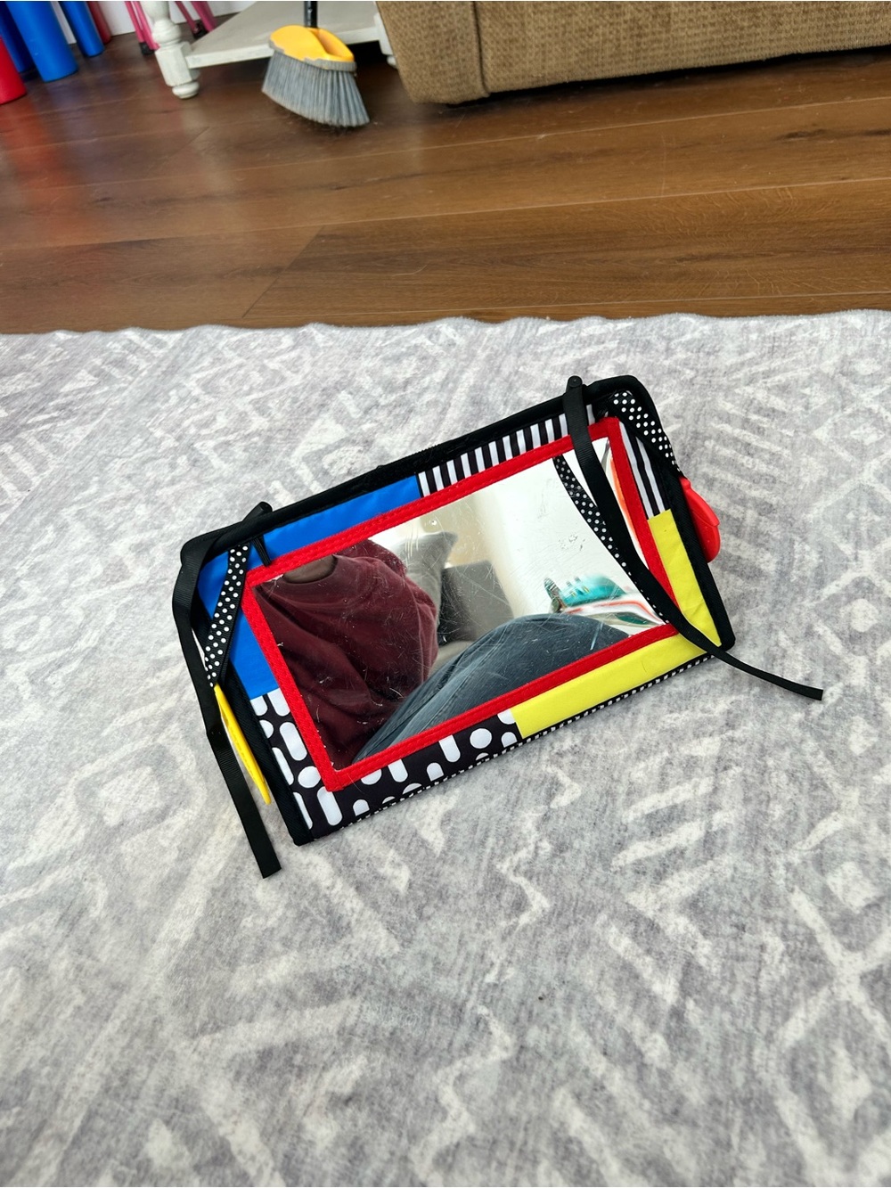 Amazon Colorful Infant Mirror Toy with Red, Blue, Yellow, Black Accents